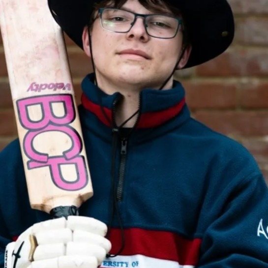 Ben Parsons in his cricket bat repair workshop